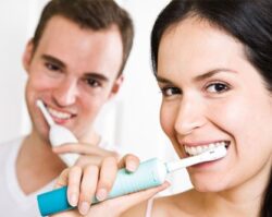 Couple brushing teeths